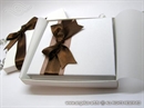 white hardcover greeting card with brown bow