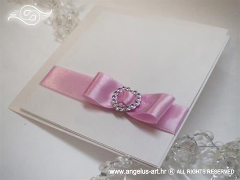 white and pink wedding invitation