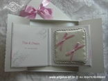 wedding rings pad with pink bows