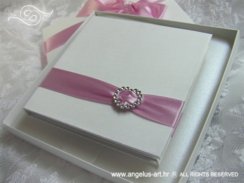 pink and white wedding rings pad